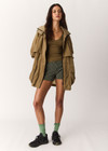 THE UPSIDE women's brown Rylan Anorak is designed for a relaxed fit, mid-length, made from tan wrinkled water-resistant fabric. Made for lifestyle.
