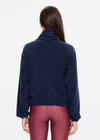 THE UPSIDE women’s navy recyled Sol Fleece Jacket offers a relaxed fit and features a zip through front, front zip pockets, elasticated waist and cuffs and contrast paracord zip pullers. Made for lifestyle.