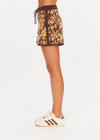 THE UPSIDE women's floral organic cotton Copacabana Leon Knit Short features a soft and supportive fit, side stripes, zip pockets and a drawcord waistband. Made for lifestyle.