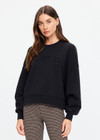 THE UPSIDE women's black organic cotton Paloma Crew is designed for an oversized fit and features dropped shoulders, ribbed trims and rhinestone logo detailing. Made for lifestyle.