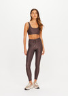 THE UPSIDE women's geo recycled supersoft Poet 25inch Midi Legging features a soft and supportive fit, mid rise waist, adjustable drawcord and signature geo print. Made for yoga and pilates.
