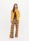 THE UPSIDE women's yellow organic cotton Bonito Dylan Knit Jacket offers a relaxed fit and features raglan sleeves, front patch pockets and contrast stripe detailing. Made for lifestyle.