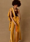 THE UPSIDE women's yellow organic cotton Bonito Moby Knit Pant is designed for a soft and supportive fit and features a high rise waist, side stripe detailing and adjustable drawcord. Made for lifestyle.