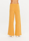 THE UPSIDE women's yellow organic cotton Bonito Moby Knit Pant is designed for a soft and supportive fit and features a high rise waist, side stripe detailing and adjustable drawcord. Made for lifestyle.
