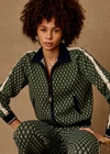 THE UPSIDE women's Viva Margot Knit Jacket is a regular fit, featuring a geo jacquard knit design, contrast stripe detailing and front patch pockets. Made for lifestyle.
