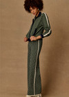 THE UPSIDE women's Viva Juniper Knit Pant is a soft and supportive fit and features a straight leg silhouette, geo jacquard knit design and contrast side stripe detailing. Made for lifestyle.