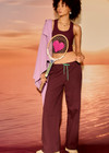 THE UPSIDE women's plum organic cotton Pele Estelle Pant is designed for a relaxed fit and features a wide leg barrel silhouette, elasticated waistband and contrast drawcord detailing. Made for lifestyle.
