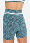 THE UPSIDE women's green Seamless 4inch Spin Short is designed for a supportive and comfortable fit and features a mid rise waist, seamless construction and ribbed striped waistband detailing. Made for yoga and pilates.