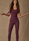 THE UPSIDE women's plum Pele 25inch Legging is designed for a supportive and comfortable fit and features a high rise waist, recycled rib fabrication and clean tonal finish. Made for yoga and pilates.