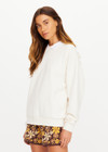 THE UPSIDE women's natural organic cotton Pascal Collared Crew offers a relaxed fit and features a collared neckline, scalloped edge detailing and ribbed trims. Made for lifestyle.