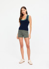 THE UPSIDE women's cream organic cotton blend Viva Jaya Knit Short features a mid rise fit and jacquard geo detailing with an embroidered arrow logo. Made for lifestyle.