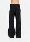 THE UPSIDE women's black lyocell linen blend Noir Elita Pant offers a true to size fit with a mid rise waist, contrast piping and slanted side seam pockets. Made for lifestyle.