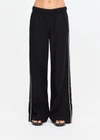 THE UPSIDE women's black lyocell linen blend Noir Elita Pant offers a true to size fit with a mid rise waist, contrast piping and slanted side seam pockets. Made for lifestyle.