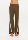 THE UPSIDE women's green Petra Flare Pant combines a true-to-size mid rise fit with side seam pockets, striped side tape and hem splits. Made for lifestyle.