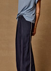 THE UPSIDE women's navy Lago Elita Pant is designed for a true-to-size mid rise fit and features a wide leg silhouette, side pockets and an adjustable drawcord waist. Made for lifestyle.