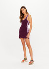 THE UPSIDE women's purple organic cotton blend Lori Knit Mini Dress is a true-to-size style featuring a scoop neckline, contrast side stripes and an embroidered logo. Made for tennis.