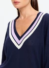 THE UPSIDE women's navy linen cotton blend Bonita V Neck Knit features a regular fit and dropped shoulders, striped neckline detailing and ribbed trims. Made for lifestyle.