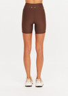 THE UPSIDE women's brown Daytona 5inch Spin Short offers a soft and supportive fit with a mid rise waist, contrast side binding and adjustable drawcord. Made for yoga and pilates.