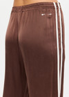THE UPSIDE women's brown Marnie Silk Wide Leg Pant is true to size with high-rise fit, elasticated waistband, and cream side seam bindings. Made for lifestyle.
