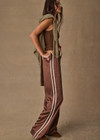 THE UPSIDE women's brown Marnie Silk Wide Leg Pant is true to size with high-rise fit, elasticated waistband, and cream side seam bindings. Made for lifestyle.