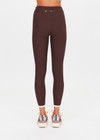 THE UPSIDE women's chocolate Rhythm 25inch Legging is mid-rise and features cream and pink binds along side seams in our recycled rib fabrication. Made for yoga and pilates.