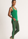 THE UPSIDE women's green Rhythm 25inch Legging is mid-rise and features cream and light green binds along side seams in our recycled rib fabrication. Made for yoga and pilates.
