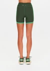 THE UPSIDE women's green Rhythm 5inch Spin Short is mid-rise and features cream and light green binds along side seams in our recycled rib fabrication. Made for yoga and pilates.