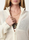 THE UPSIDE women's cream Hunter Knitted Jacket is designed for a relaxed fit and features an open knit construction and zipper opening. Made for lifestyle.