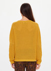 THE UPSIDE women's yellow Felice Knit Crew is designed for a regular fit and features an open knit construction, rolled neckline and arrow logo on sleeve. Made for lifestyle.