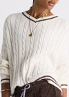THE UPSIDE women's cream Millie V Neck Knit Sweater is designed for a relaxed fit and features a high v neckline and chocolate metallic stripes along cuffs, neckline and hem. Made for lifestyle.
