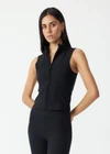 THE UPSIDE women's black Divina Lizzy Zip Tank Top is designed for a soft and supportive fit and features a full length zip opening and collar in cotton modal fabrication. Made for lifestyle.