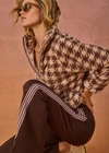 THE UPSIDE women's check recycled Palacio Harlow Fleece Pullover is relaxed fit with quarter-zip woven binds and zip pockets. Made for lifestyle.