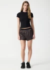 THE UPSIDE women’s brown Levi Run Short is a mid-rise style with a curved hem, ribbed elastic waistband and black mesh tape. Made for running.