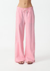 THE UPSIDE women’s pink Cortina Elita Pant is a mid-rise style with a soft elastic waistband, slanted side-seam pockets and cream piping. Made for lifestyle.