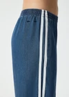 THE UPSIDE women's blue lyocell Lykke Marnie Wide Leg Pant is designed for a high-rise fit and features an elasticated waistband and cream binds down the side seams. Made for lifestyle.