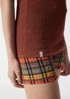 THE UPSIDE women's brown nylon viscose Wales Knit Tank Top is designed for a relaxed fit and features a basketball shape with ribbed neckline and armholes. Made for lifestyle.