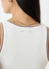 THE UPSIDE women’s natural organic cotton Victoria Rib Tank is a fitted style with a scoop neck and striped rib detailing at the neckline and armholes. Made for lifestyle.