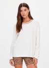 THE UPSIDE women's natural organic cotton Mali Long Sleeve Top is a relaxed fit and features a ribbed neckline in butter with navy piping. Made for lifestyle.