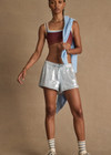 THE UPSIDE women's blue Austen Sequin Short is a mid-rise fit and features a curved hem, and a light blue elasticated drawcord. Made for lifestyle.