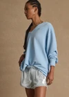 THE UPSIDE women's blue Austen Sequin Short is a mid-rise fit and features a curved hem, and a light blue elasticated drawcord. Made for lifestyle.