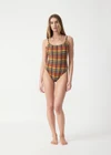 THE UPSIDE women's check Del Sol Flow One Piece is low coverage and features a high shaped legline and navy elastic adjustable straps. Made for swim.
