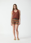 THE UPSIDE women's check Del Sol 4 Inch Spin Short is mid rise and features a navy elastic drawcord with aglets and is fully lined. Made for yoga and pilates.