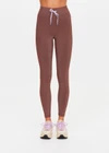 THE UPSIDE women's espresso metallic Galaxia 25inch Legging is mid-rise and features a purple drawcord with aglets and embroidered purple arrow logo. Made for yoga and pilates.