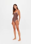 THE UPSIDE women's espresso metallic Galaxia Flow One Piece features a sccop front neckline and low back with adjustable straps and embroidered arrow logo on back. Made for swim.