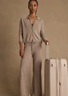 THE UPSIDE women’s brown Amelie Cashmere Knit Pant is a mid-rise, straight-leg style with an elasticated waistband and tonal knitted drawcord. Made for lifestyle.