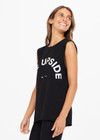 THE UPSIDE women's black Muscle Tank is made of organic cotton jersey. It features low-cut arm openings, rolled bind detail at the sleeve and a white horsehoe logo at the centre front.
