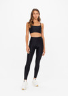 THE UPSIDE women's black Original Super Soft Yoga Pant is made from breathable, quick-drying and moisture-wicking with a 4-way stretch. It features a stretch drawcord waistband and a white arrow logo at the back.