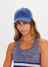 THE UPSIDE Corduroy Soft Cap in Blue is a soft retro fit cap with embroidered preppy logo at front and adjustable velcro strap in a soft corduroy denim blue.