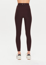 THE UPSIDE Peached 25inch High Midi Pant in dark brown is a sustainable 25inch midi length legging with a “V” shaped high-rise waistband and printed arrow logo at back waistband.