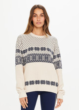 THE UPSIDE Aspen Boo Knit in Cream and Navy in a Fair Isle like design is an organic cotton classic knit sweater trimmed in cream with an embroidered arrow patch at back neck.